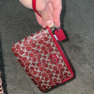 Coach clutch wristlet